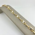 PULSERA ESLABONES OVALADOS CON DETALLES DE TORNILLO DOS OROS 18K