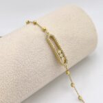 PULSERA CON ZIRCONES ESTILO MOVE ORO 18K