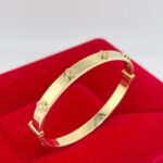 PULSERA RIGIDA TREBOLES CON ZIRCONES EN RELIEVE ORO 18K ITALIANO